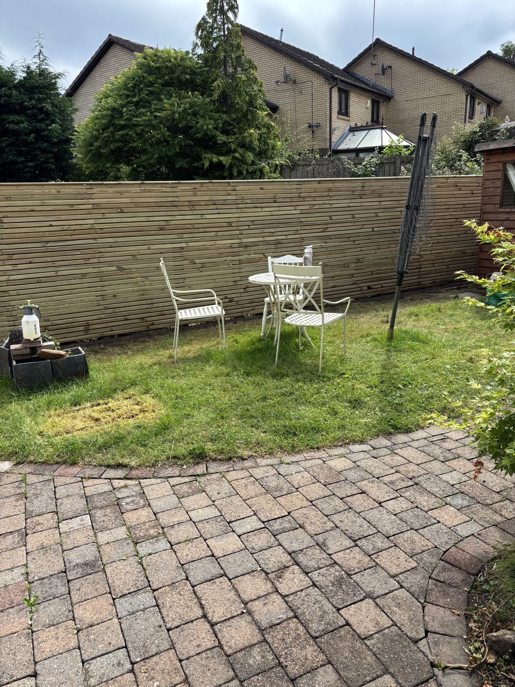 Finished slatted fence, garden left tidy
