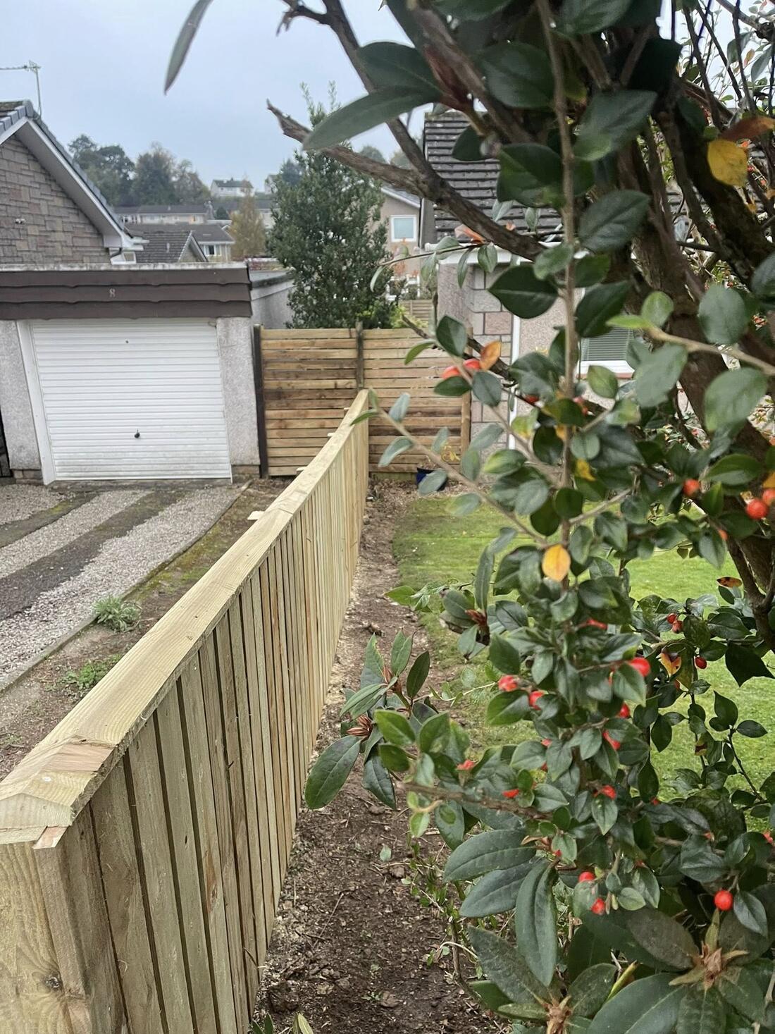 Stepped close-board fence