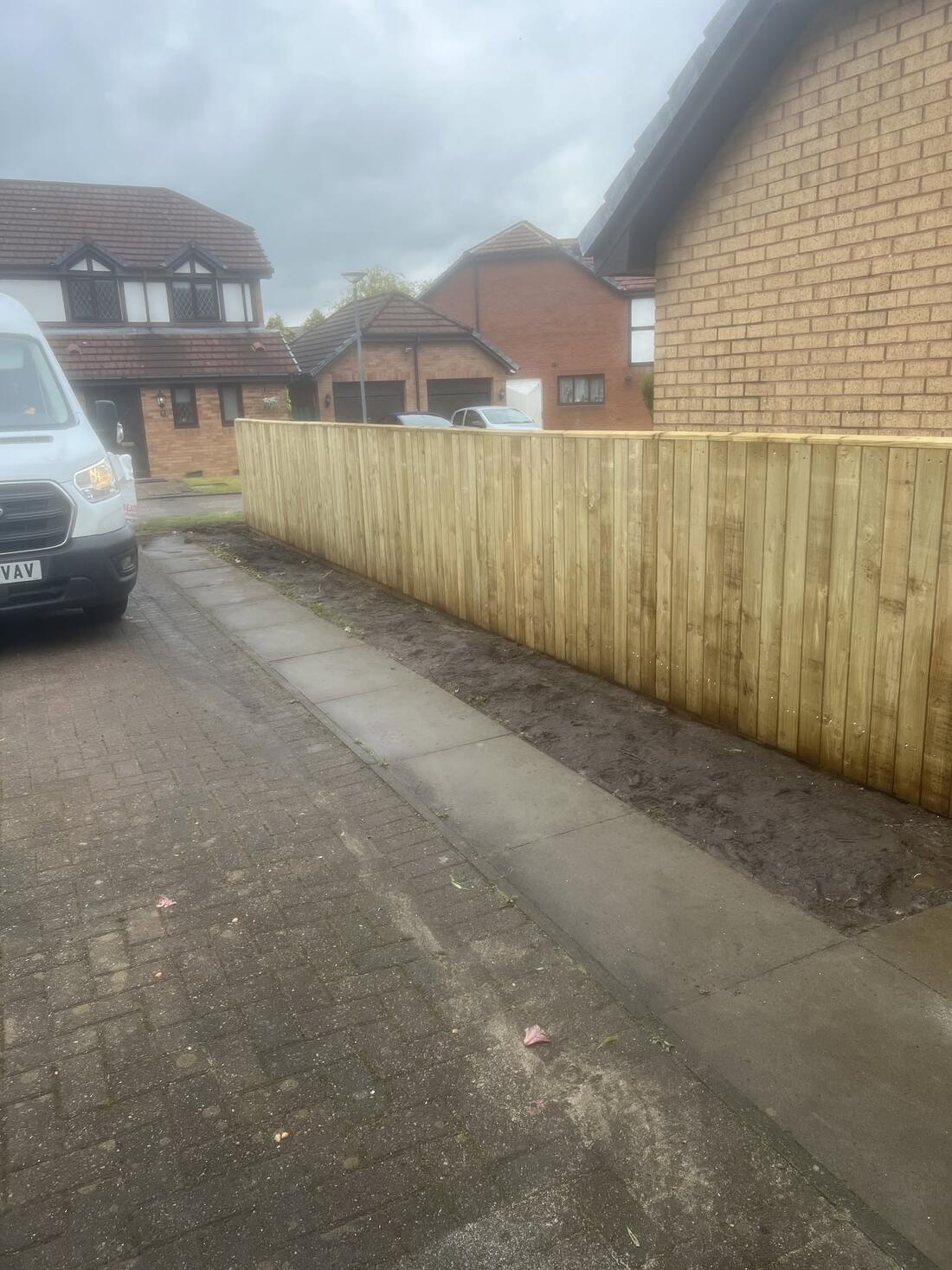 Driveway close-board fence